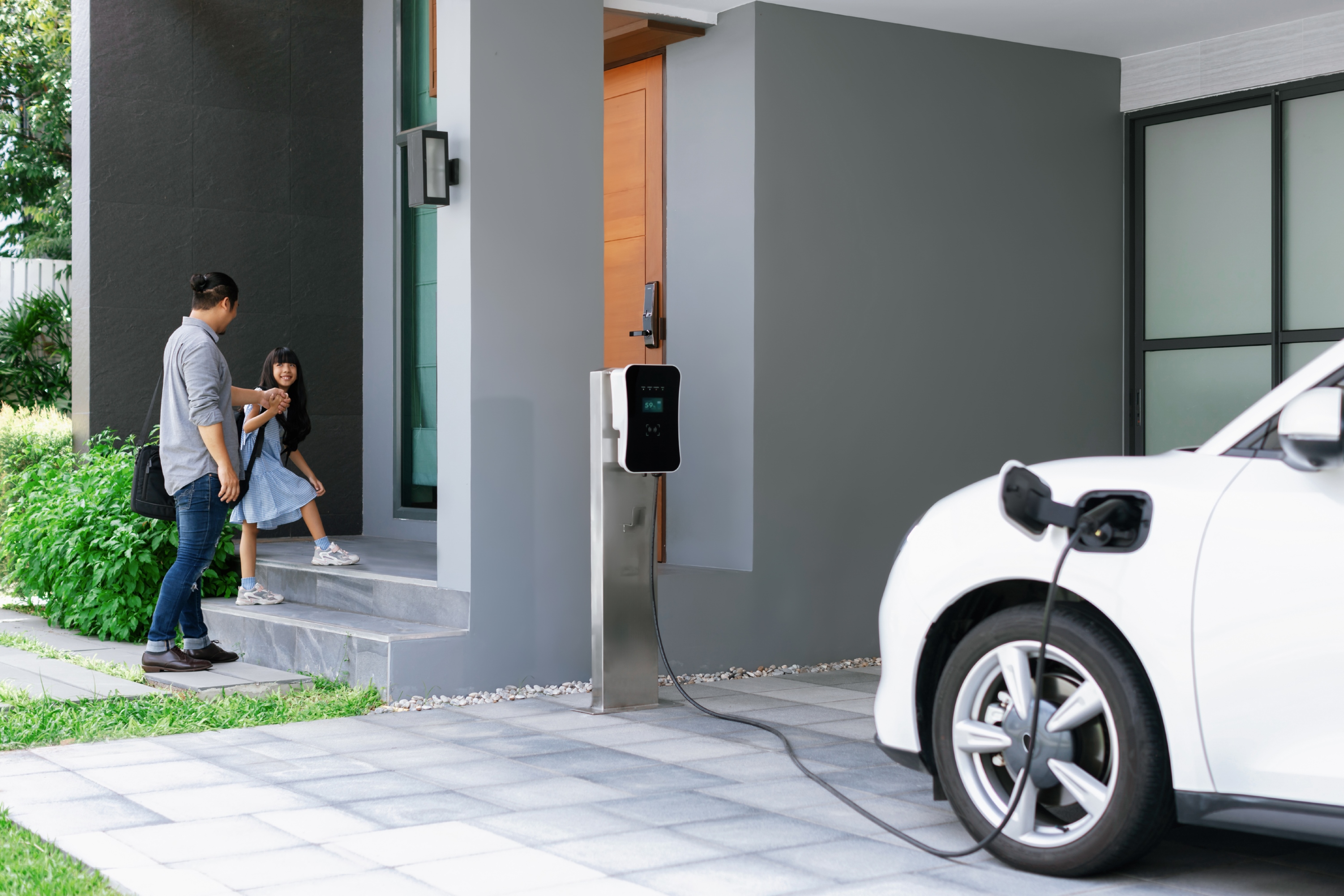 Electric vehicle connected to a home charging point